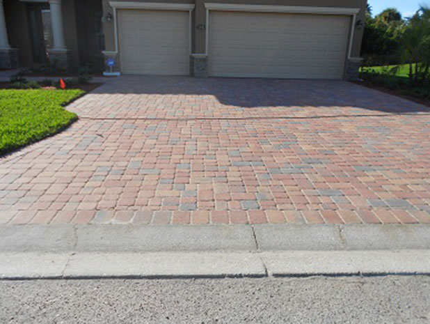 Driveway stained before Gorilla Kleen pressure washing Sarasota