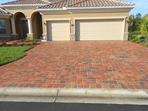 Outdoor pavers professionally cleaned and sealed by Gorilla Kleen, a leading pressure washing company in Sarasota FL