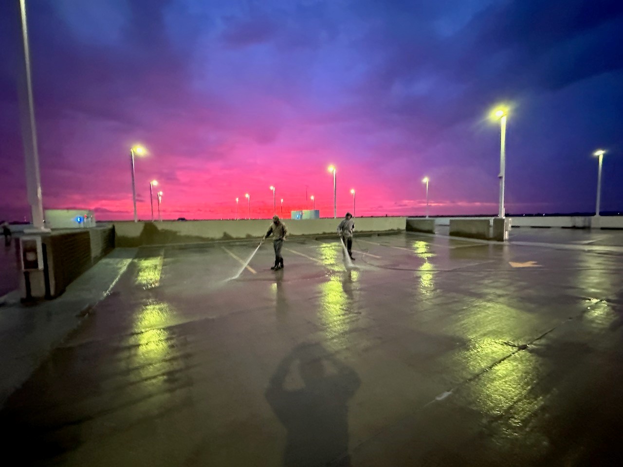 cleaning a roof at dusk in Sarasota